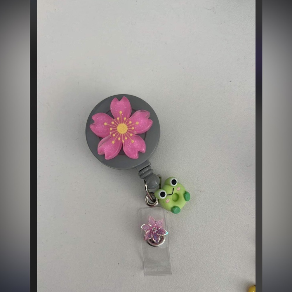 ID reel, retractable, for anyone who wears name tags.